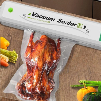 Вакууматор побутовий Vacuum Sealer апарат для пакування продуктів автоматичний вакуумний пакувальник Вакууматор побутовий Vacuum Sealer апарат для пакування продуктів автоматичний вакуумний пакувальник